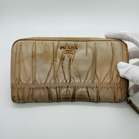 Prada Handbags - Prada large crease Zip around Wallet